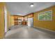 Functional kitchen with wood cabinets and ample counter space, ideal for cooking and meal preparation at 1051 Old Us 421, Lillington, NC 27546