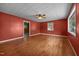 Living room with hardwood floors, neutral walls, and ample natural light, creating a warm and inviting space at 1051 Old Us 421, Lillington, NC 27546