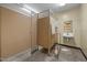 Functional commercial bathroom stall featuring a metal shelving unit with sink and mirror at 1085 Old Us 421, Lillington, NC 27546
