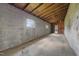 Inside a large warehouse with block wall construction featuring small windows at 1085 Old Us 421, Lillington, NC 27546
