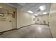 Office space with a drop ceiling, concrete floors, and light-colored walls at 1085 Old Us 421, Lillington, NC 27546