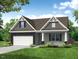 Charming single-Gathering home with a mix of stone and siding, complemented by a well-manicured lawn at 109 Arundel Dr, Archer Lodge, NC 27527