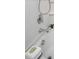 Close up of bathtub with white tiles and stylish chrome fixtures at 1116 Kingston Grove Drive Dr, Cary, NC 27519