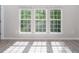 Sunlit bedroom featuring three large windows offering great views and natural light at 1116 Kingston Grove Drive Dr, Cary, NC 27519