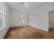 Spacious bedroom with hardwood floors, a large window offering natural light at 112 Rectory St, Oxford, NC 27565
