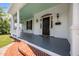 Charming home featuring a covered front porch and landscaped yard at 112 Rectory St, Oxford, NC 27565