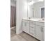 Clean bathroom featuring double sinks, granite countertops, and a shower/tub combo at 121 Canyon Gap Way, Raleigh, NC 27610