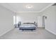 Spacious bedroom boasts a tray ceiling and offers plenty of space and natural light at 121 Canyon Gap Way, Raleigh, NC 27610