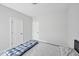 Neutral bedroom showcases gray walls, white trim, and two white doors at 121 Canyon Gap Way, Raleigh, NC 27610