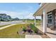 Beautifully landscaped front yard with lush greenery and stone accents, creating a warm and inviting entrance to home at 121 Canyon Gap Way, Raleigh, NC 27610