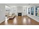 A modern living room featuring fireplace, recessed lights and lots of natural lights at 121 Canyon Gap Way, Raleigh, NC 27610