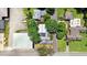 Overhead view of a property showcasing its mature trees, expansive land, and building roofs at 125 W Pine St, Pine Level, NC 27568