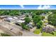 Overhead view showing local businesses and nearby homes in a residential area at 125 W Pine St, Pine Level, NC 27568