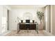 Bright home office with desk, comfortable chair, stylish lamps, and decorative mirror at 1416 Jay Rd, Knightdale, NC 27545