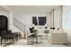 Inviting living room with plush sectional sofa, modern accents, and large windows at 1420 Jay Rd, Knightdale, NC 27545