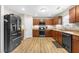 Well-equipped kitchen with stainless steel appliances, ample counter space, and modern cabinets at 2011 Unbridled Dr, Knightdale, NC 27545