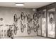 Secured bike storage with bikes mounted to the wall and baby stroller parking at 2201 W Cornwallis Rd # 1B-3, Durham, NC 27705