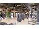 A modern gym with exercise equipment, mirrors, and a unique ceiling design at 2201 W Cornwallis Rd # 2B-3, Durham, NC 27705