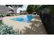 Outdoor swimming pool surrounded by many lounge chairs at 2201 W Cornwallis Rd # 1B-3, Durham, NC 27705