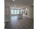 Open concept living space with modern kitchen, island with sink, and recessed lighting at 2203 Lambert Rd # 67, Cary, NC 27519
