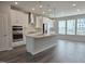 Modern kitchen features a central island, stainless steel appliances, and sleek white cabinetry at 2203 Lambert Rd # 67, Cary, NC 27519