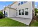 Charming home featuring a cozy back patio perfect for outdoor entertaining on a well-maintained lawn at 226 Begen St, Morrisville, NC 27560