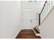 Bright entryway with hardwood floors, staircase, and natural light at 226 Begen St, Morrisville, NC 27560