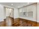 Open-concept living room with hardwood floors and plenty of natural light at 226 Begen St, Morrisville, NC 27560