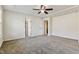 Spacious carpeted bedroom featuring a ceiling fan and neutral walls at 226 Begen St, Morrisville, NC 27560