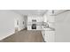 Clean kitchen featuring white cabinets, granite countertops and stainless steel appliances at 2305 Pinecroft Dv, Burlington, NC 27217
