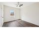 Bright bedroom with wood floors, a large window, and ample space at 2309 Pinecroft Dr, Burlington, NC 27217