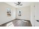 Well-lit bedroom with vinyl flooring, and large windows, providing ample natural light at 2309 Pinecroft Dr, Burlington, NC 27217