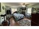 Bedroom featuring hardwood floors, a window, and closet at 2433 Zacks Mill Rd, Angier, NC 27501
