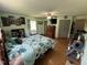 Bedroom showcasing hardwood floors, a window seat, and closet at 2433 Zacks Mill Rd, Angier, NC 27501