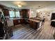 Functional kitchen with great lighting and flows into the dining area at 2433 Zacks Mill Rd, Angier, NC 27501