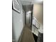 Hallway with access to stairs and multiple rooms at 2452 Bay Harbor Dr, Raleigh, NC 27604