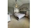 Bright main bedroom with king bed, ceiling fan, and lots of natural light at 2452 Bay Harbor Dr, Raleigh, NC 27604