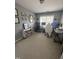 Cozy home office with natural light, neutral color scheme, and space for dual workstations at 2452 Bay Harbor Dr, Raleigh, NC 27604