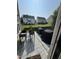 Back patio with seating, planters and privacy fence for outdoor enjoyment at 2452 Bay Harbor Dr, Raleigh, NC 27604