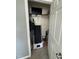 Storage closet with black mini treadmill and white wire shelf at 2452 Bay Harbor Dr, Raleigh, NC 27604