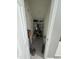 Walk-in storage area with metal shelving and ceramic flooring at 2452 Bay Harbor Dr, Raleigh, NC 27604
