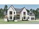 Stunning white brick home with gray accents, complemented by professionally landscaped front yard at 249 Mollie Meadow Dr, Zebulon, NC 27597
