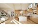 Bright, airy kitchen with a spacious island, light wood cabinets, and modern lighting fixtures at 249 Mollie Meadow Dr, Zebulon, NC 27597