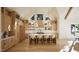 Bright modern kitchen with a large island, seating, and decorative lighting fixtures at 249 Mollie Meadow Dr, Zebulon, NC 27597