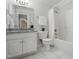 Bathroom featuring neutral cabinets, a granite countertop, and shower-tub combo at 3020 Woods Walk Way, Rocky Mount, NC 27804
