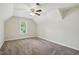 Bedroom with large window bringing in natural light, ceiling fan, and neutral colored walls at 3020 Woods Walk Way, Rocky Mount, NC 27804