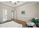 Comfortable bedroom with sitting area, soft carpet, and relaxing atmosphere at 3020 Woods Walk Way, Rocky Mount, NC 27804