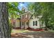 An attractive two-story home featuring brick and siding, complemented by well-maintained landscaping at 3020 Woods Walk Way, Rocky Mount, NC 27804