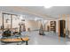Expansive basement featuring exercise equipment, storage shelves, and ample open space at 3070 Cameron Dr, Henderson, NC 27536