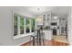 Eat in Kitchen features bright light and access to outdoor deck. Stainless appliances at 3070 Cameron Dr, Henderson, NC 27536
